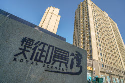 China Evergrande ordered to liquidate by Hong Kong court