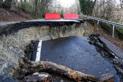 Landslide collapses road after heavy rains in Sochi