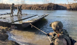 Russian servicemen build pontoon bridge in border area of Kursk Region