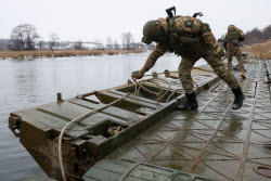 Russian servicemen build pontoon bridges in Kursk Region