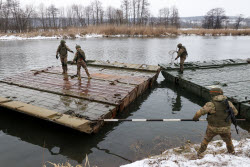 Russian servicemen build pontoon bridges in Kursk Region