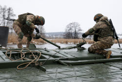 Russian servicemen build pontoon bridges in Kursk Region