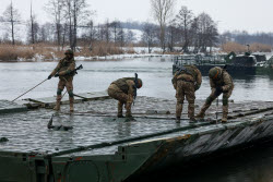 Russian servicemen build pontoon bridges in Kursk Region