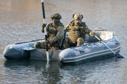 Russian servicemen build pontoon bridges in Kursk Region