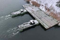 Russian servicemen build pontoon bridges in Kursk Region