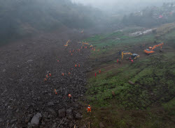 Rescue Efforts Ramp Up After Landslide Hit Sichuan Village