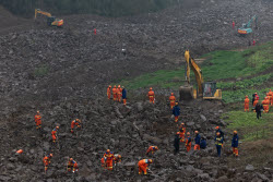 Rescue Efforts Ramp Up After Landslide Hit Sichuan Village