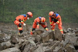 Rescue Efforts Ramp Up After Landslide Hit Sichuan Village