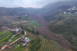 Rescue Efforts Ramp Up After Landslide Hit Sichuan Village