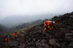 Rescue Efforts Ramp Up After Landslide Hit Sichuan Village