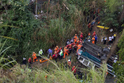 Several killed after a bus plunged off a highway bridge in Guatemala City