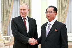 Russia's President Putin meets with Secretary of Central Committee of WPK Ri Hi Yong