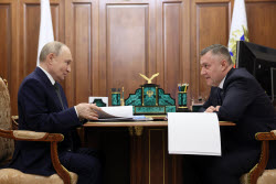 Russia's President Putin meets with Irkutsk Region Governor Kobzev