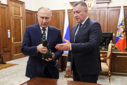 Russia's President Putin meets with Irkutsk Region Governor Kobzev