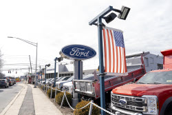 Trump grants one-month exemption for US automakers from new tariffs on imports from Mexico, Canada