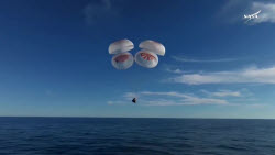 Two astronauts stranded for nine months on the ISS return with an ocean splashdown