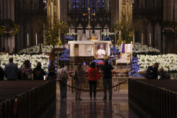 People visit St. Patrick's Cathedral to pay their respects to the late Pope Francis