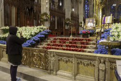 People visit St. Patrick's Cathedral to pay their respects to the late Pope Francis