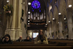 People visit St. Patrick's Cathedral to pay their respects to the late Pope Francis