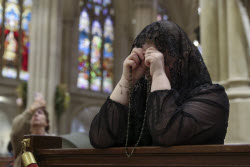 People visit St. Patrick's Cathedral to pay their respects to the late Pope Francis