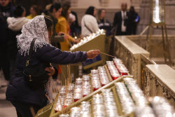 People visit St. Patrick's Cathedral to pay their respects to the late Pope Francis