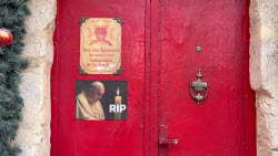 Faithful react to the death of Pope Francis at the Church of the Holy Sepulchre