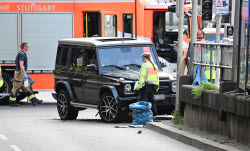 Car drives into group of people
