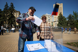 Historical reenactment of 2014 status referendum in Donetsk