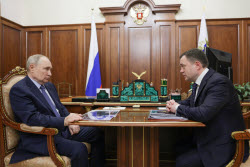 Russian President Putin meets with former Promsvyazbank Board Chairman Fradkov