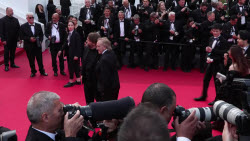 Wes Anderson’s troupe returns to Cannes red carpet—in a bus