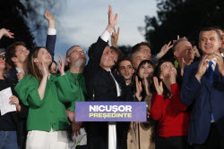 Reactions to first exit polls in Romanias presidential runoff