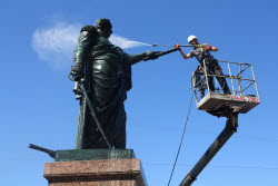 Washing Mikhail Kutuzov statue in St Petersburg, Russia