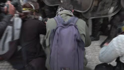 Police detain two photojournalists during pensioners’ protest in Argentina