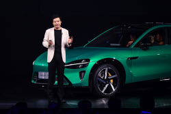 Tech firm Xiaomi presents new products and pre-launches new car YU7