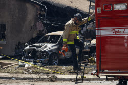 Small plane crashes in residential neighborhood of San Diego, California