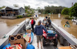 Port Macquarie locals deliver aid amid east coast flooding in Australia