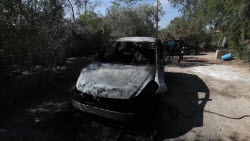 A group of Israeli settlers attacks a village in the central West Bank province of Salfit