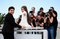 Woman and Child - Photocall - 78th Cannes Film Festival
