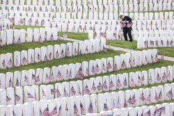 Flags placed on military veteran graves for Memorial Day in Brooklyn