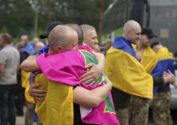 Russia and Ukraine exchange 