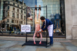 'Skinned'  PETA Activist Strung Up Outside Clothes Store In Grisly Anti-Leather Protest