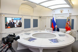 Russia's President Putin meets with families awarded Orders of Parental Glory