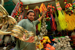 Roadside shop sells ornaments ahead of Eid al-Adha in Peshawar