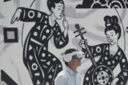 Visitors Experience XR Immersive Exhibition In Hangzhou