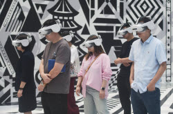 Visitors Experience XR Immersive Exhibition In Hangzhou