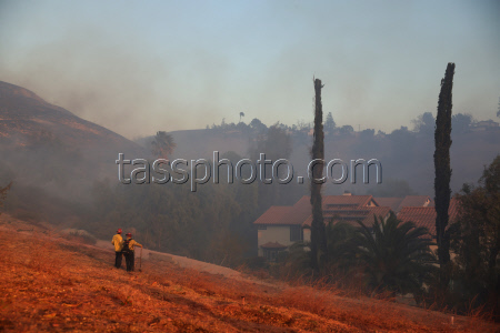 Wildfires continue to rage through Los Angeles area