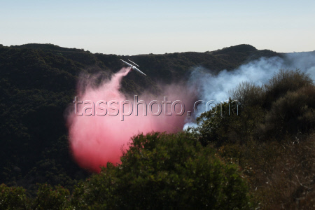 Wildfires continue to rage through Los Angeles area