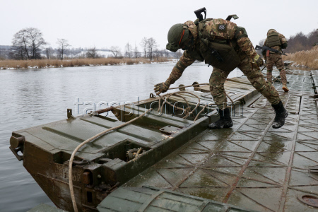 Russian servicemen build pontoon bridges in Kursk Region