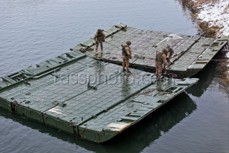 Russian servicemen build pontoon bridges in Kursk Region