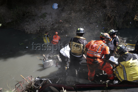 Several killed after a bus plunged off a highway bridge in Guatemala City